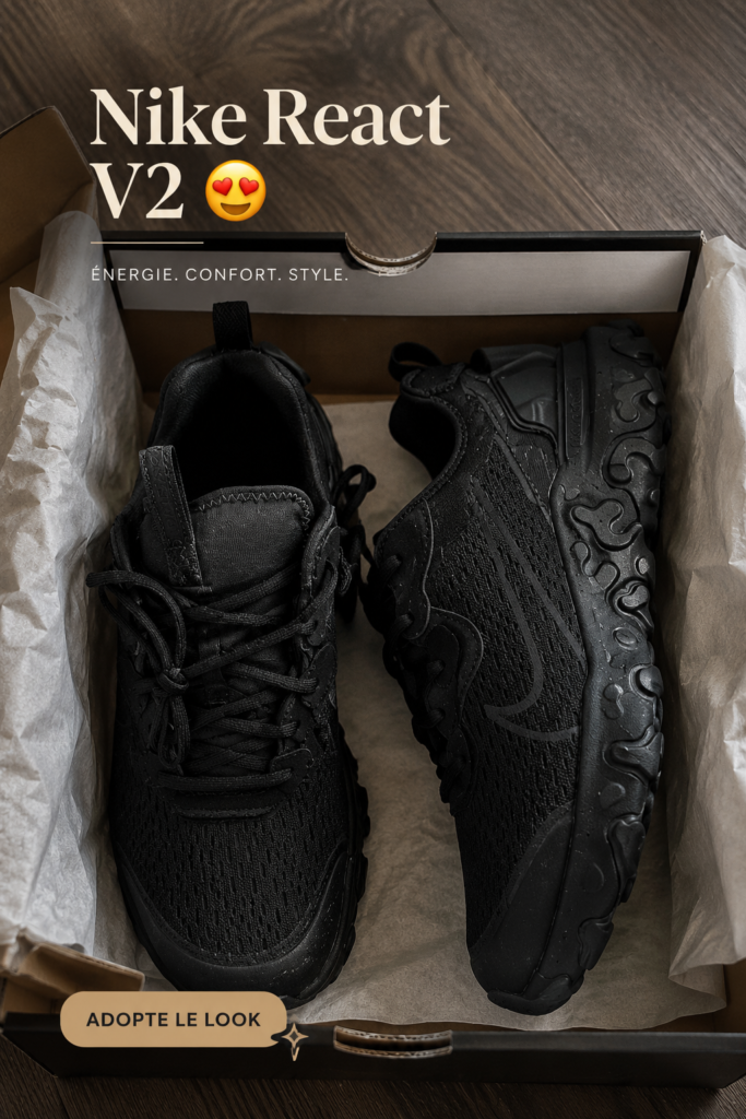 Nike React V2 en couleur stylée sur un fond neutre.